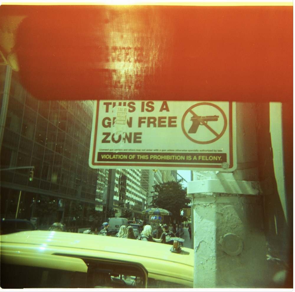 Gun Free Zone / Loose Battery In Camera Body